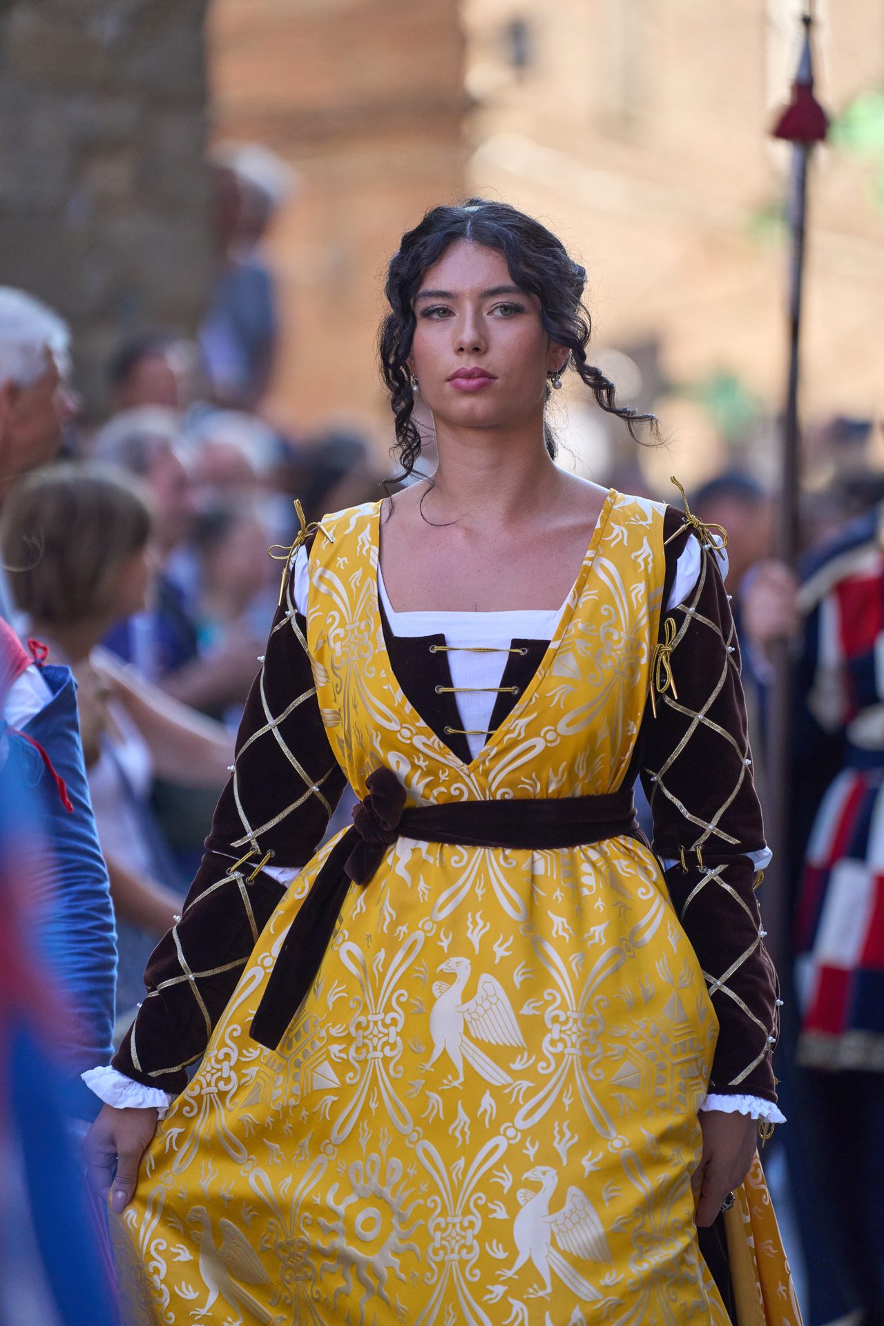 Lady of the Borgo in a yellow gown