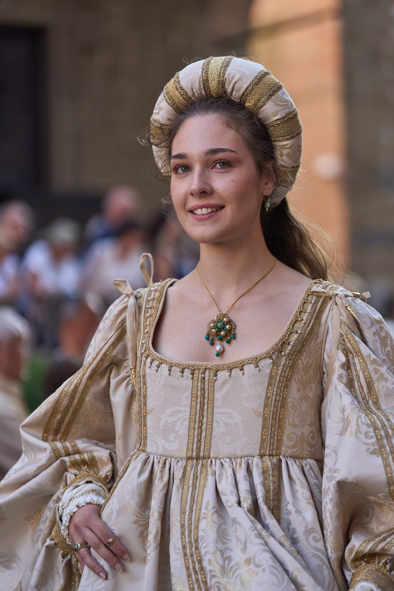 Noblewoman in a white and gold gown