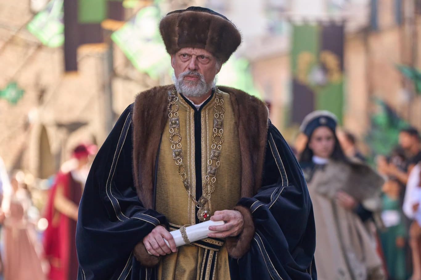 Elder magistrate in a gold robe