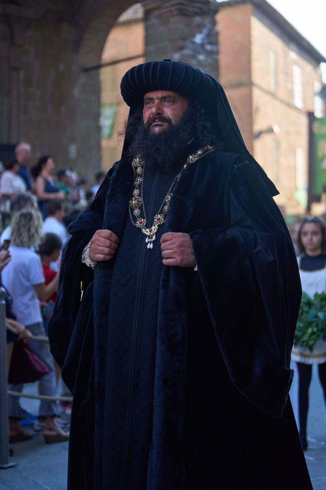 Notable in a black cloak