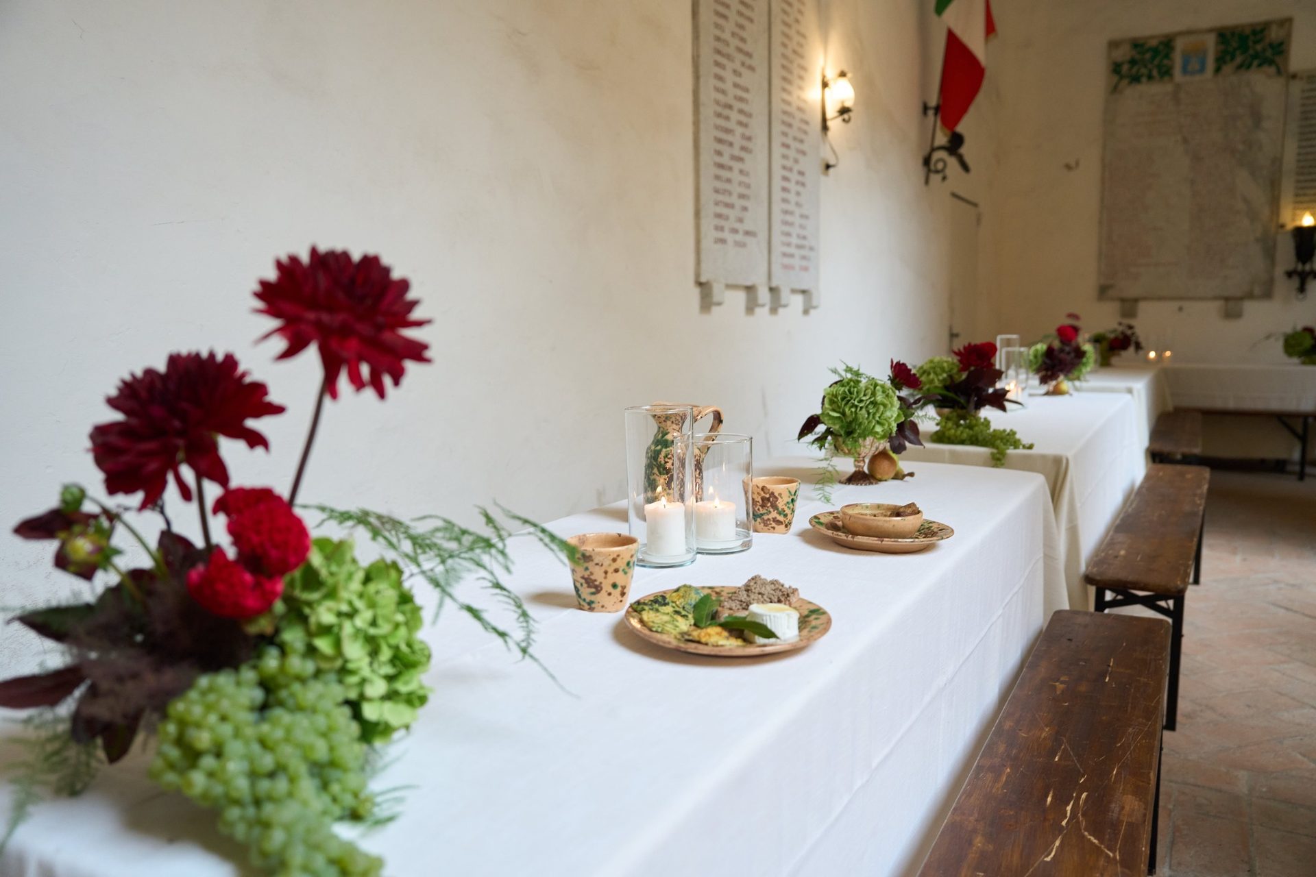Table with burgundy flowers