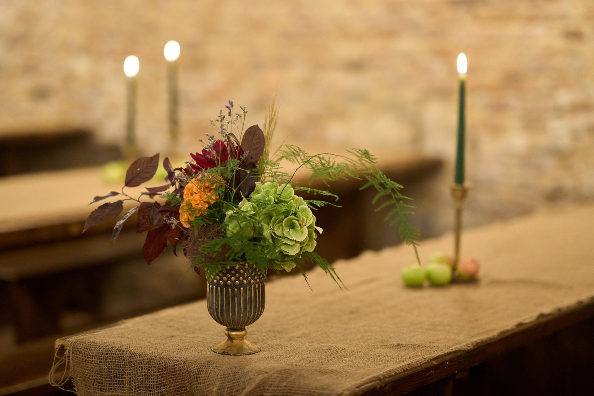 Vase with flowers and candles